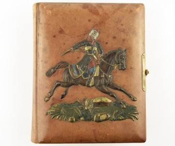 Альбом для фотографий-визиток с изображением казака на коне.